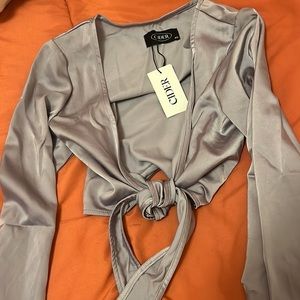 Satin long flare sleeve top